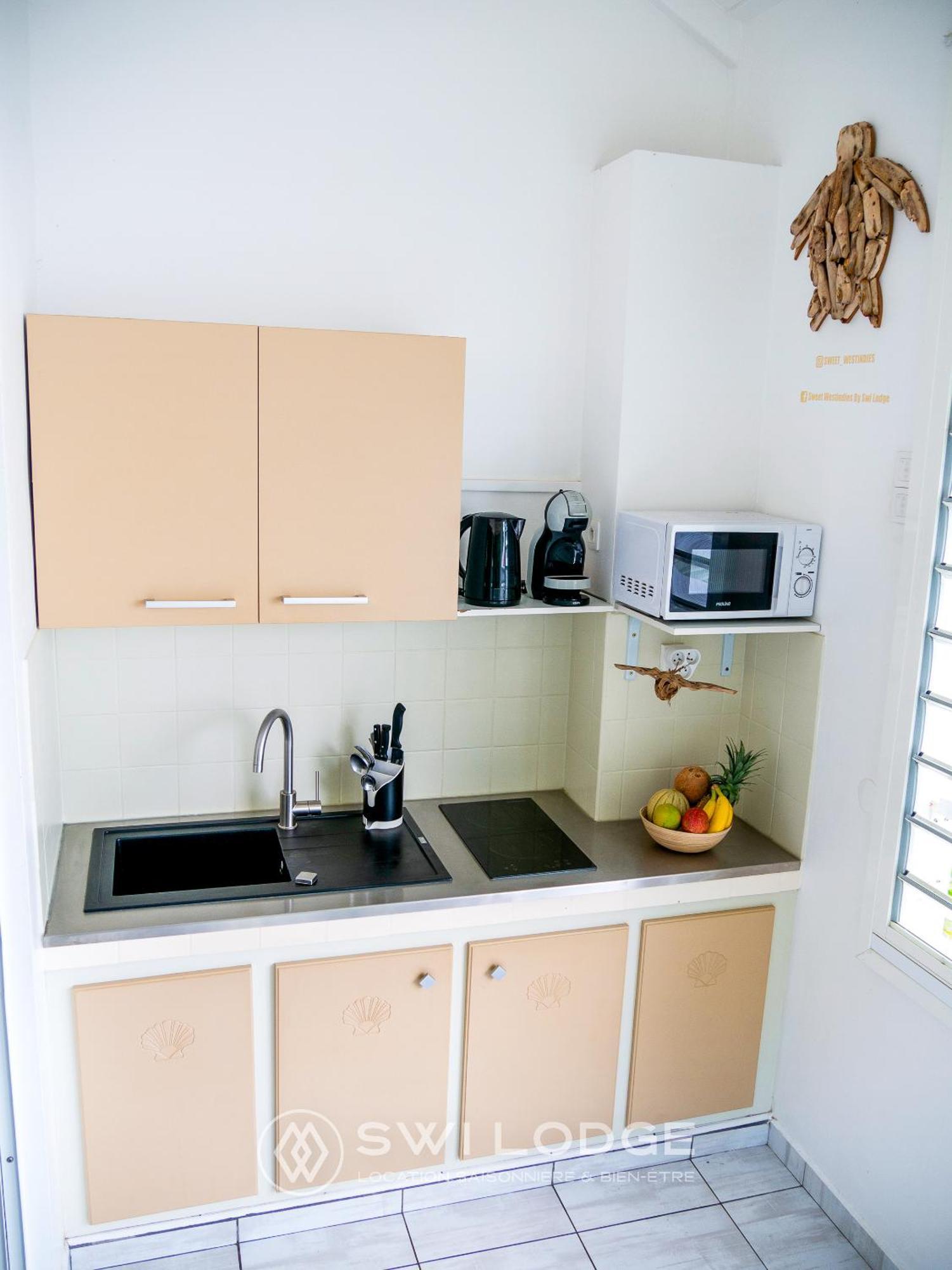 Appartement SWI LODGE VUE SUR MER Le Moule Exterior foto