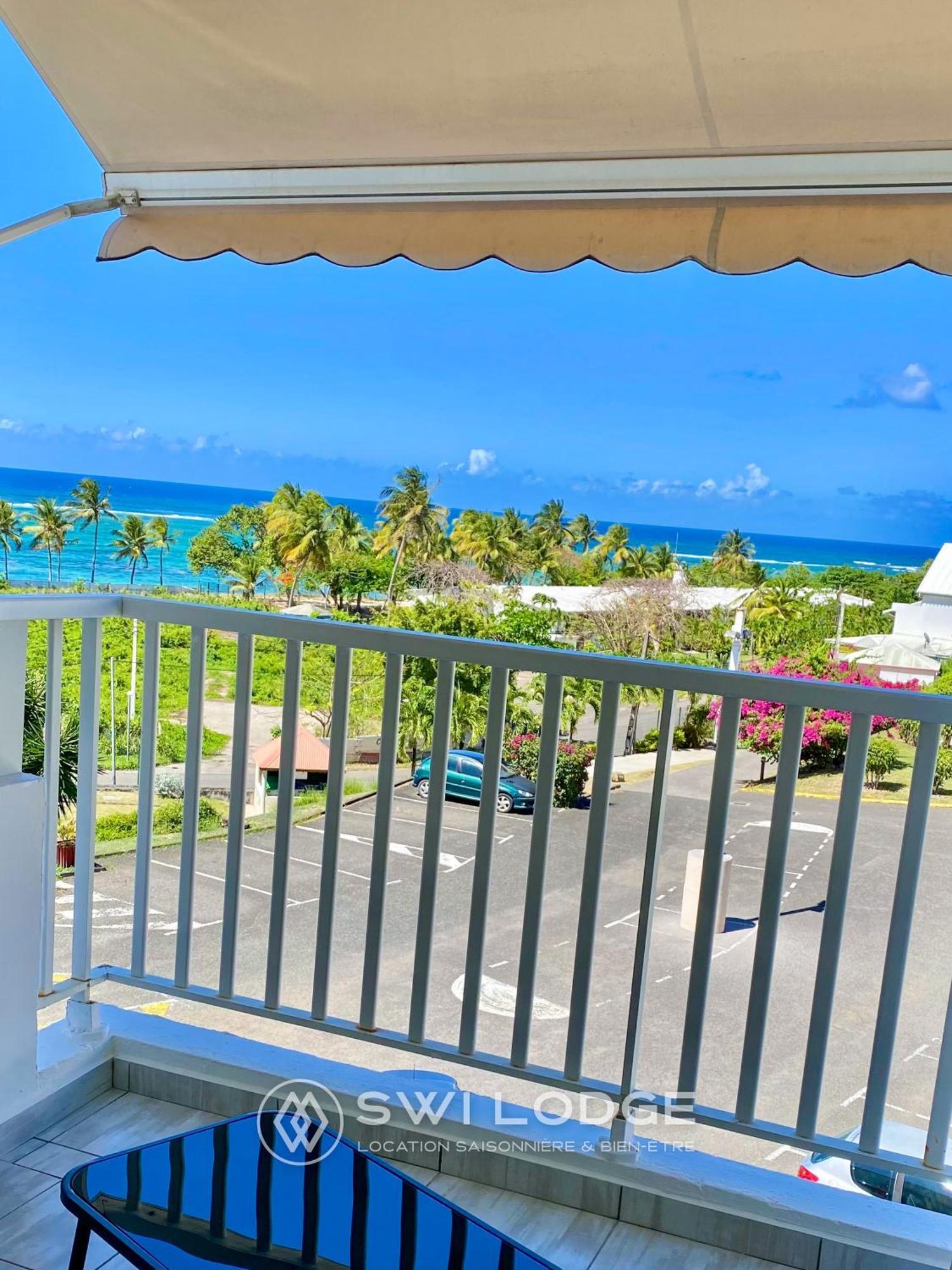 Appartement SWI LODGE VUE SUR MER Le Moule Exterior foto