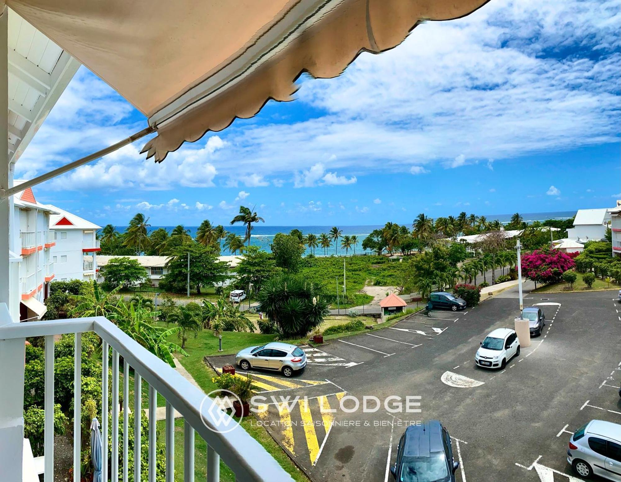 Appartement SWI LODGE VUE SUR MER Le Moule Exterior foto